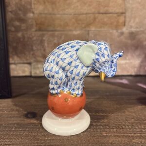 Herend .  beautiful elephant on ball.  Excellent brand new condition. Perfect
